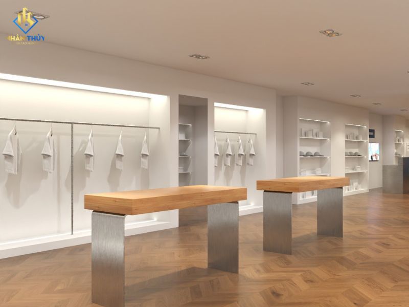 Phối cảnh hệ kệ treo quần áo và bàn trưng bày showroom LEVENTS