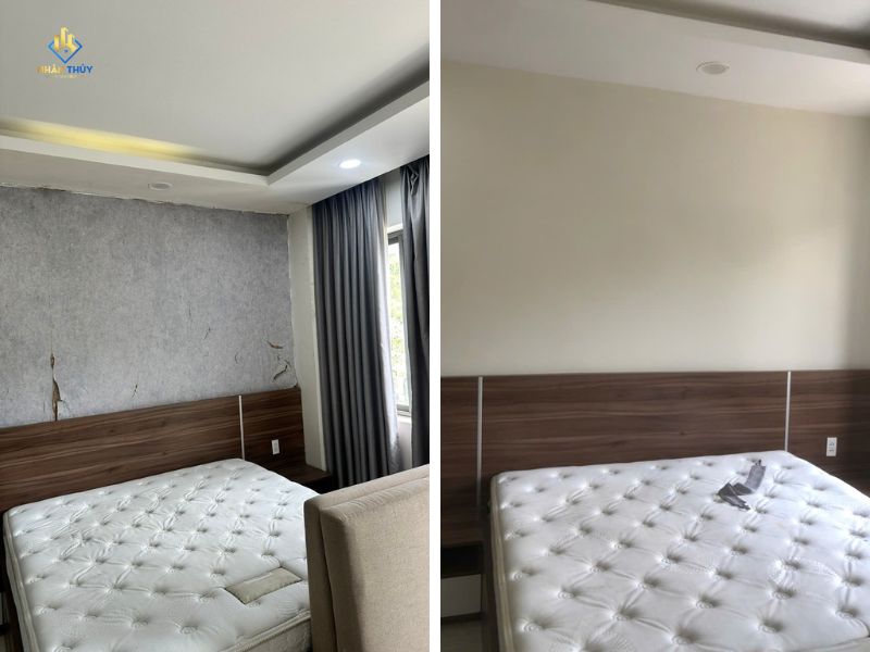 Tường phía đầu giường có vết bong nứt và bề mặt sáng màu sau khi sơn lại